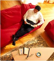Illustration - Man reading on sofa